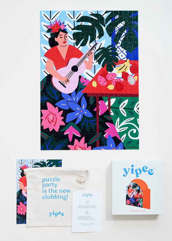 Puzzle yipee Femme à la guitare